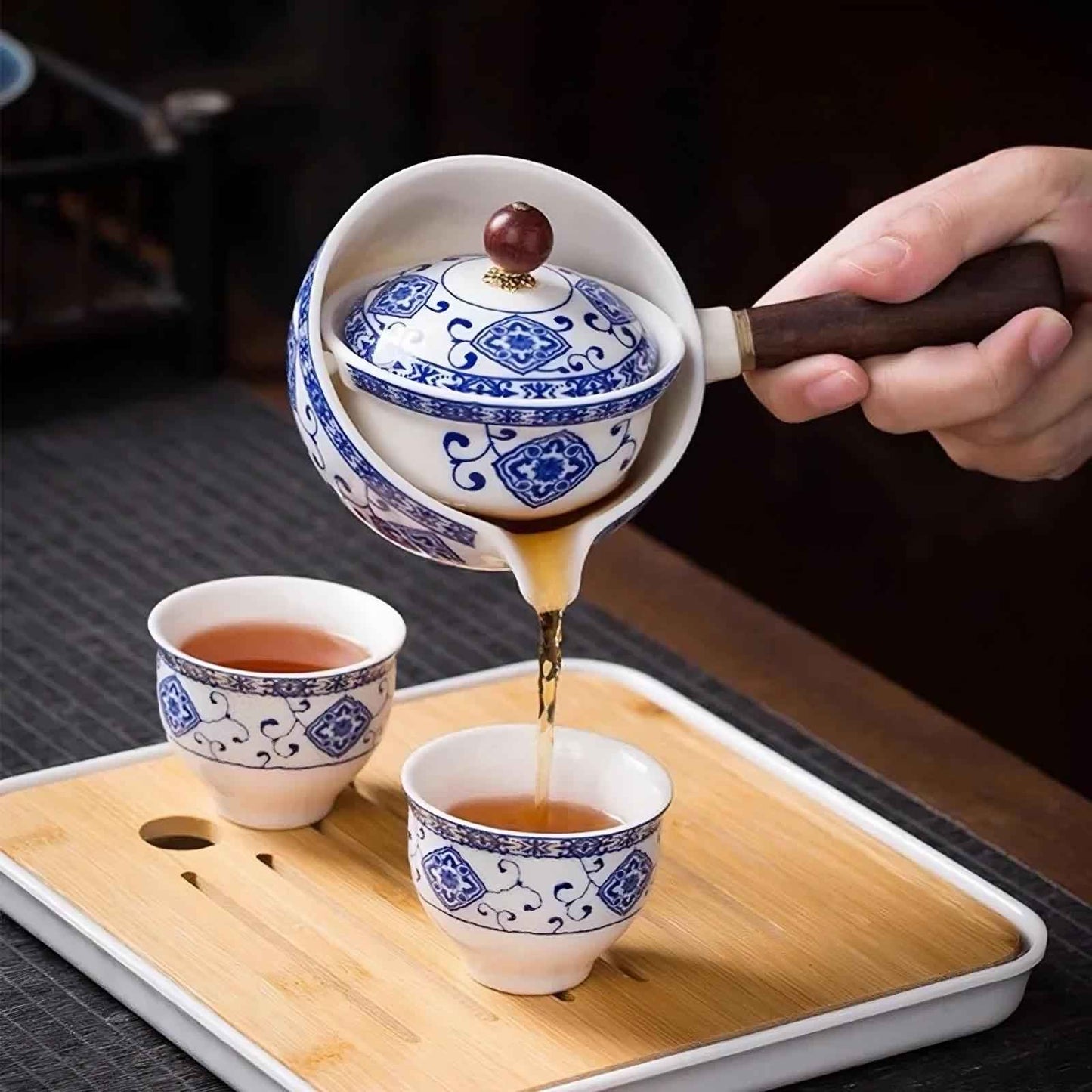 Ceramic rotating kungfu style teapot with double-layer filter, ships free across Canada